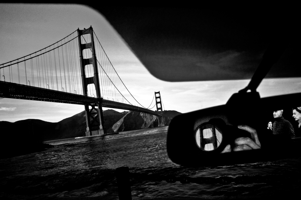 Driver Photographs Golden Gate Bridge and Reflection
